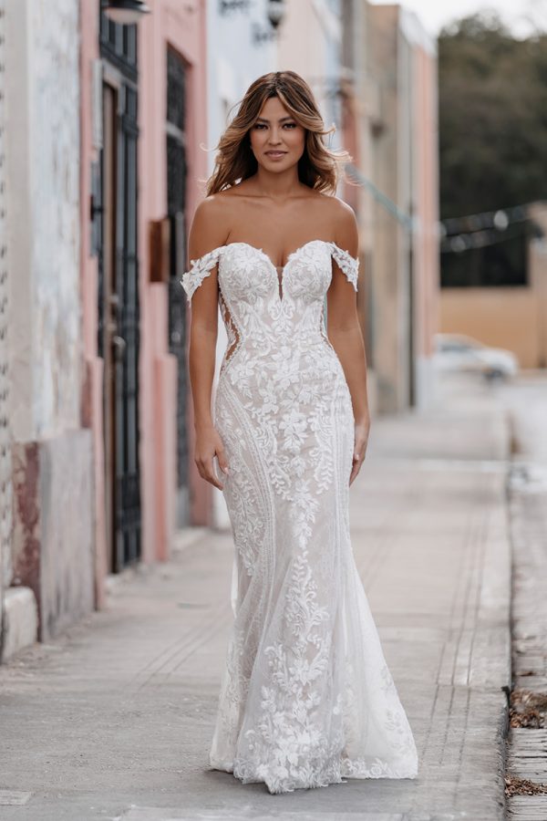 9962 Allure Bridals lush floral lace imaginable adorns the striking lines of this off-shoulder sheath gown