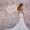 9962 Allure Bridals lush floral lace imaginable adorns the striking lines of this off-shoulder sheath gown