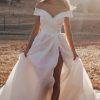 R3602 Allure Romance Crisp, architectural organza softly pleats and tucks along the waist and bodice of this romantic off shoulder gown