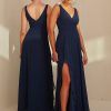 TO2493 Tania Olsen Bridesmaid Dress a V-cut neckline with 1-inch wide shoulders and a cross-over bust draping