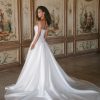 strapless A-line gown is crafted from textured Dupioni,