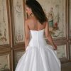 strapless A-line gown is crafted from textured Dupioni,