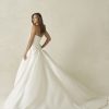 strapless A-line gown is crafted from textured Dupioni,