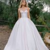 A softly pleated strapless, sweetheart neckline