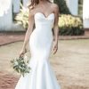 fit and flare gown features a sculptural cowl effect