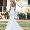 fit and flare gown features a sculptural cowl effect