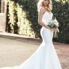 fit and flare gown features a sculptural cowl effect