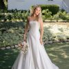 A-line gown is crafted from luminous Mikad