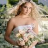 A-line gown is crafted from luminous Mikad