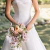 A-line gown is crafted from luminous Mikad