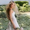 A-line gown is crafted from luminous Mikad