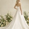 A-line gown is crafted from luminous Mikad